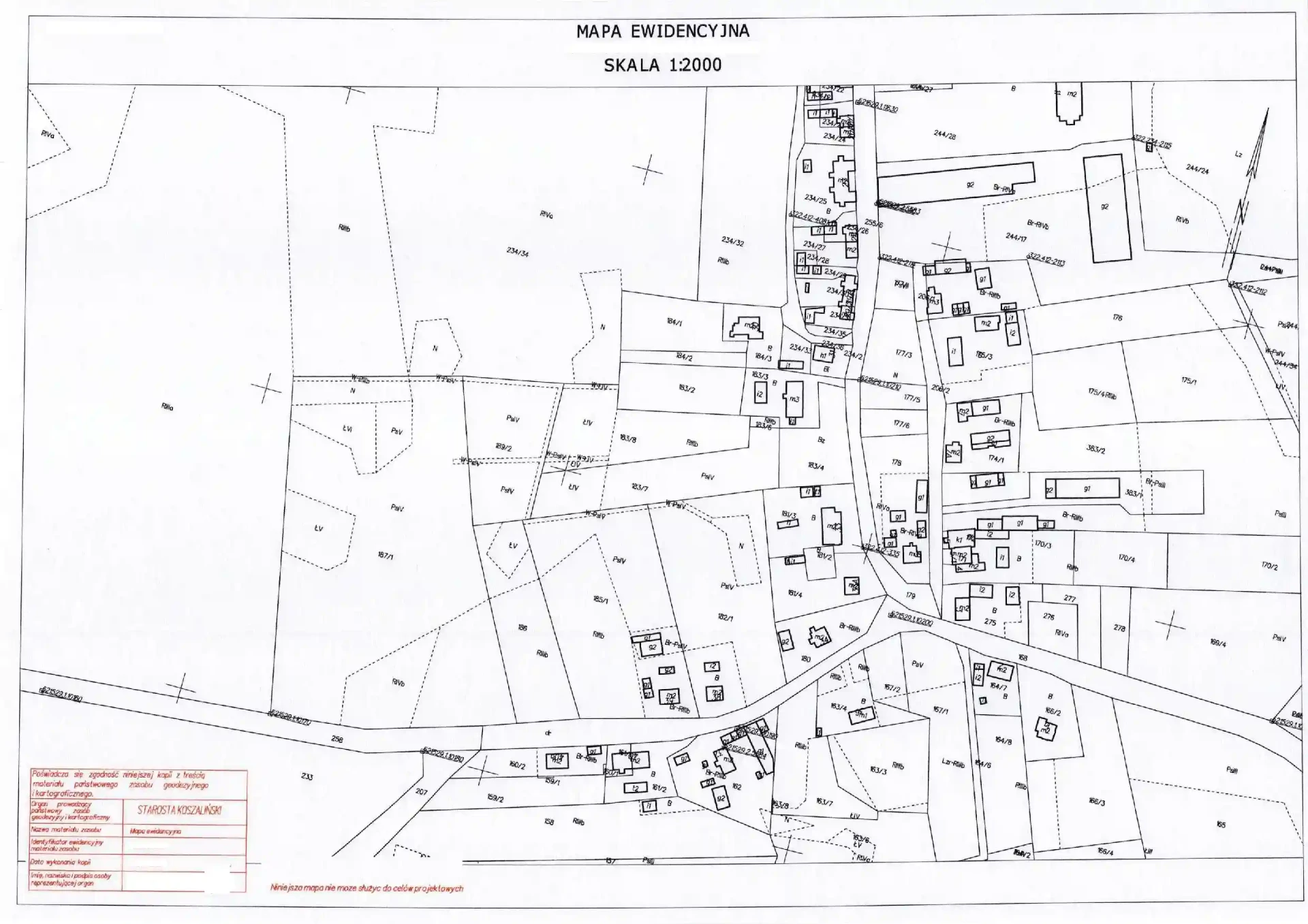 Fragment mapy ewidencyjnej w skali 1:2000 z granicami i numerami działek, budynkami oraz oznaczeniami użytków i klas gruntów