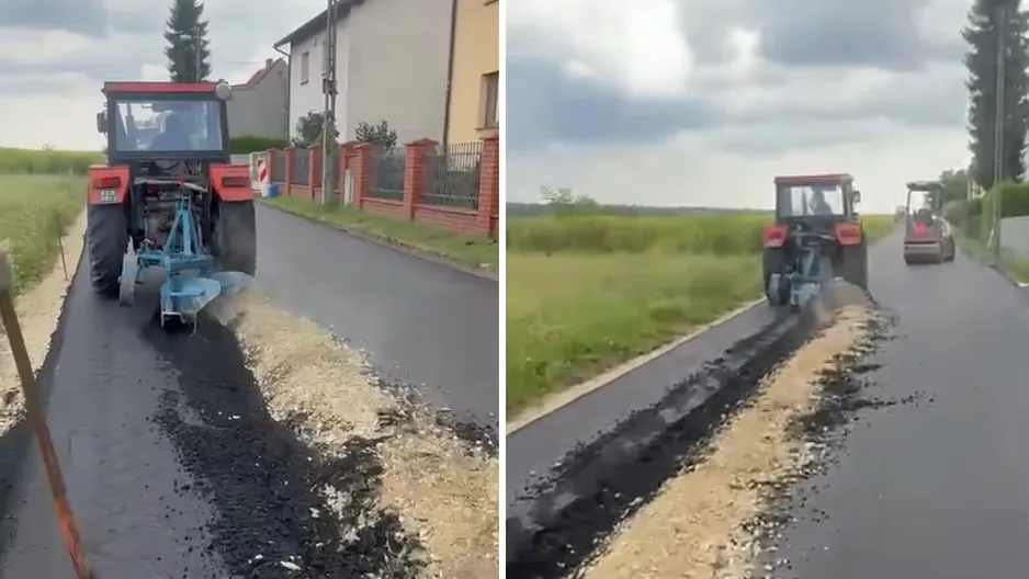 Traktor z pługiem zrywający świeżo położony asfalt na drodze przy zabudowaniach